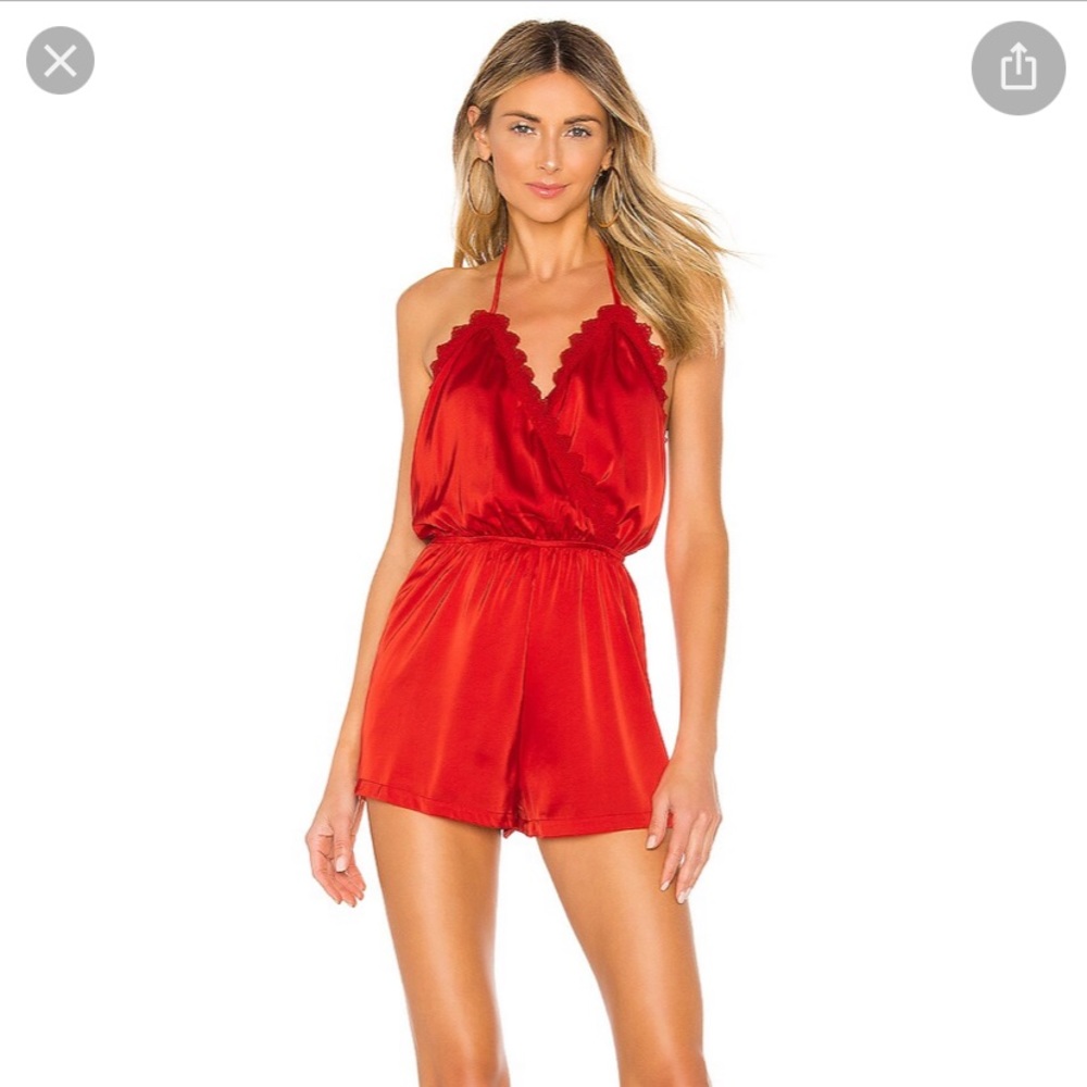 Superdown red silk material romper size XS worn once. Purchased from Revolve.
